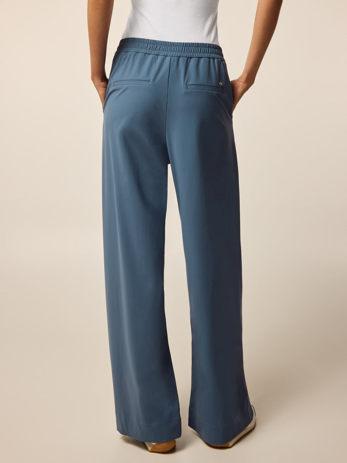 Greyson Clothiers 30" Phoenix Wide Leg Trouser in Vintage Indigo - Back View, Elastic Sport Waistband & Logo Detail
