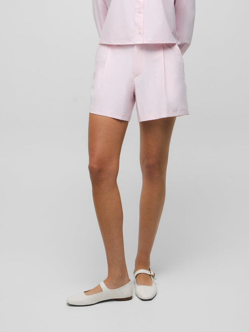 Bloom 5" Phoenix Trouser Short - Front View On Model, Pleated Women's Golf Short | Greyson Clothiers