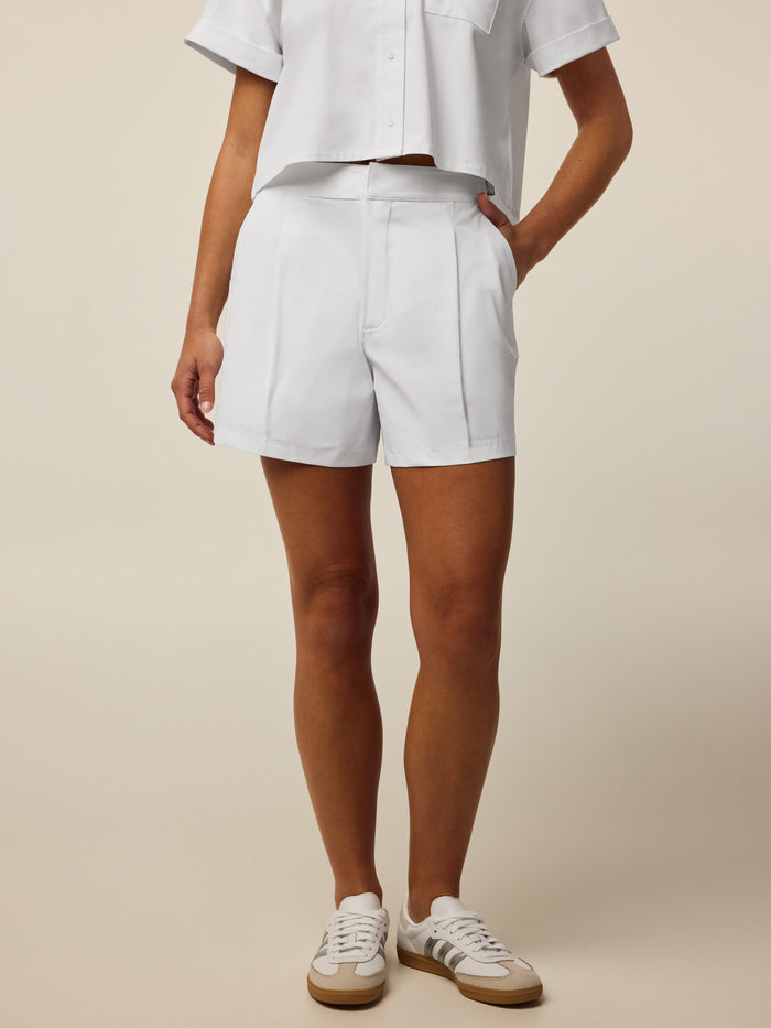 Arctic 5" Phoenix Trouser Short - Cropped Front View with Pleats On Model | Greyson Clothiers