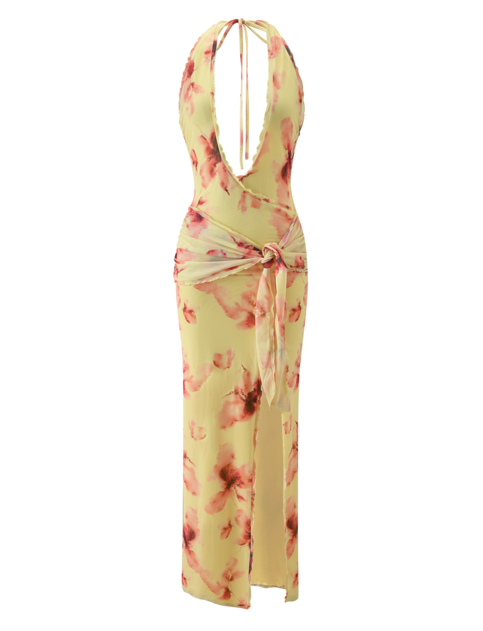 The ALLEGRA MAXI DRESS by TIGERMIST features a sleeveless, floor-length yellow watercolour floral print with elegant pink accents, a plunging deep V-neck, open back, and tied sash waist.