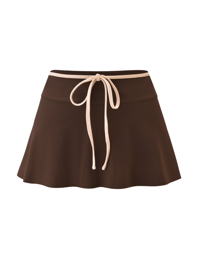 The TIGERMIST ALYSIA SKORT in chocolate is a brown A-line mini skort with a flared hem and an adjustable beige drawstring waistband, shown against a plain background.
