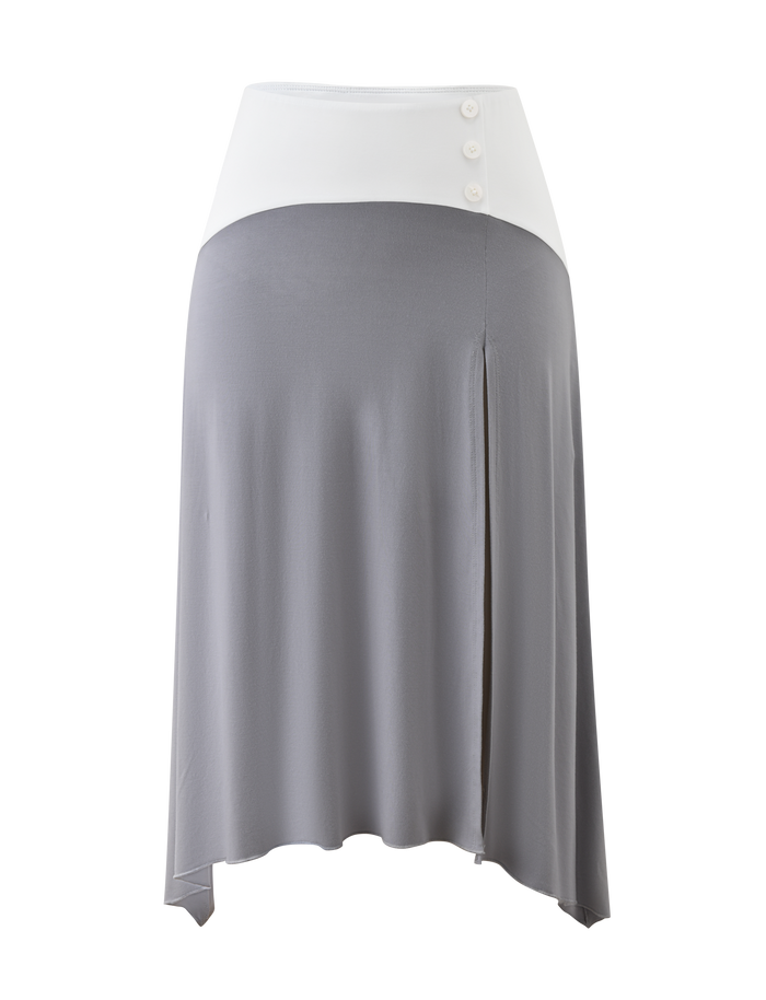 The ALYSSA HI LO SKIRT - GREY by TIGERMIST is a modern midi skirt with an asymmetrical hem, light gray color, wide white waistband with three side buttons, a front slit, and a flowy silhouette for a chic look.