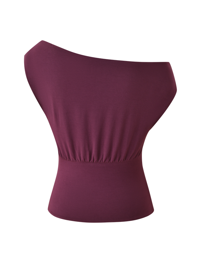 The TIGERMIST ALYSSA OFF SHOULDER TOP in plum is a sleeveless women’s top featuring an asymmetrical neckline and gathered elastic waist, shown on a plain white background.
