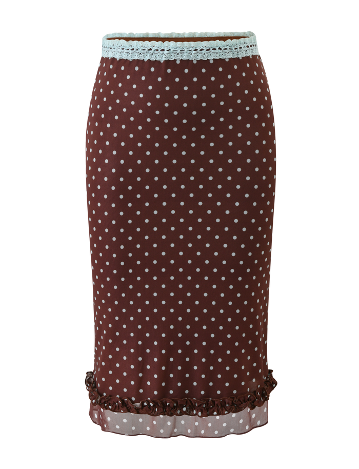 The AMARA MIDI SKIRT - POLKA DOT by TIGERMIST is a brown skirt with white polka dots, a light blue lace-trimmed waistband, and playful ruffled hem detailing for added flair.