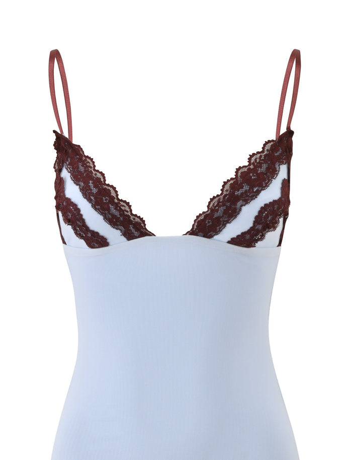 ARIES MINI DRESS - BLUE AND BROWN by TIGERMIST, featuring thin adjustable shoulder straps and contrasting trim along the neckline, displayed on a plain white background.