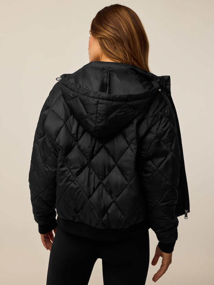 Shepherd Black Aries X-Lite Diamond Jacket - Back View with Detachable Hood | Greyson Clothiers