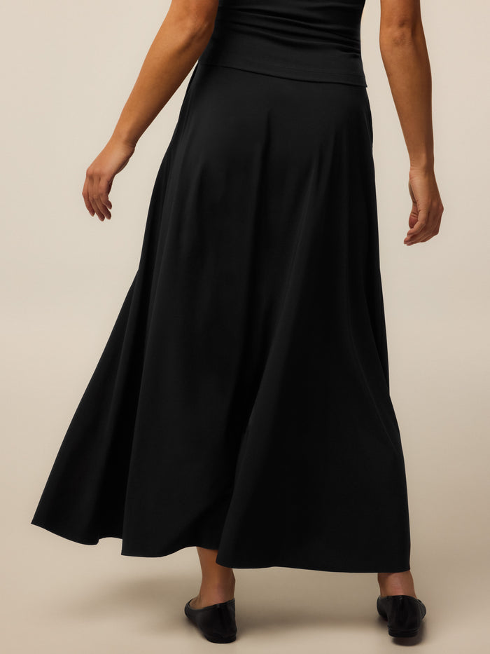 Greyson Clothiers Ashe Midi Skirt in Black - Back View, Flared A-Line Silhouette | Greyson Clothiers