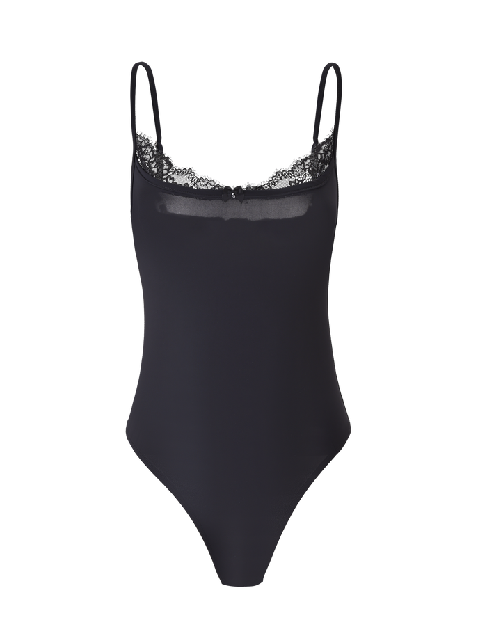 The ASTRID BODYSUIT - BLACK by TIGERMIST features adjustable shoulder straps and delicate lace trim along the neckline, shown against a plain background.