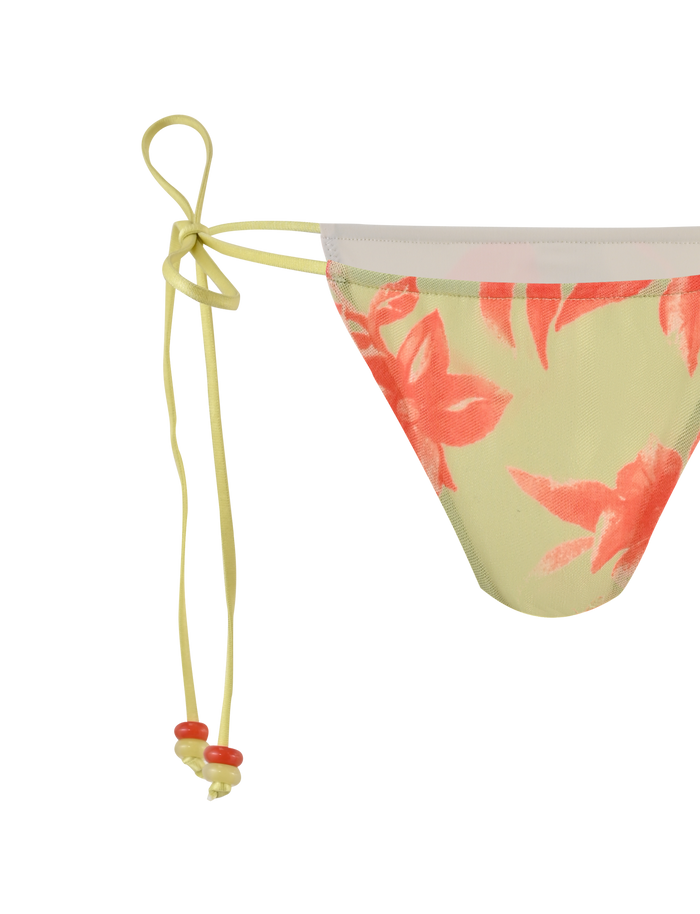 A close-up of the TIGERMIST AVE 2PC BIKINI BOTTOM - POP FLORAL shows pink flowers and side ties with small red beads, making it perfect to pair with a matching sarong set.