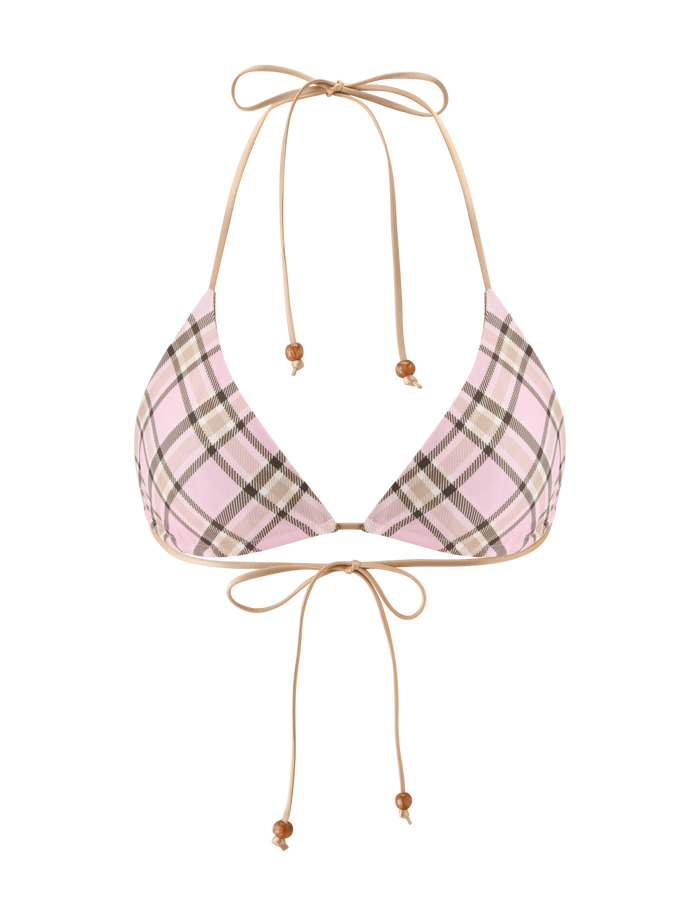 The AVE REVERSIBLE BIKINI TOP by TIGERMIST features a stylish tan and pink plaid design, beige tie straps with wooden bead accents—your must-have for chic days by the water.