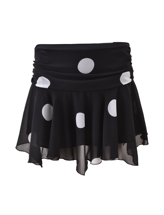 The AYDIN MINI SKIRT - BLACK by TIGERMIST is a black polka dot skirt with an asymmetrical handkerchief hem, crafted from airy chiffon and shown on a plain white background.
