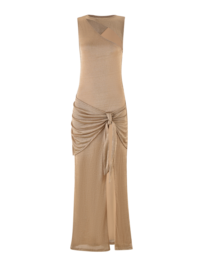 TIGERMIST's AZELMA MAXI DRESS in gold features a sleeveless metallic knit, maxi silhouette, asymmetric cutout neckline, front knot waist detail, draped skirt, and slight ruching.