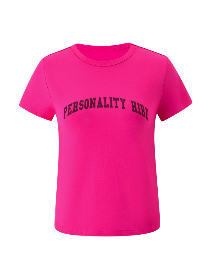 The TIGERMIST BELLA BABY TEE in hot pink features a vibrant short-sleeve design with “PERSONALITY HIRE” boldly printed in black across the chest, offering a playful and standout twist on classic vintage graphic tees—all showcased against a clean white background.