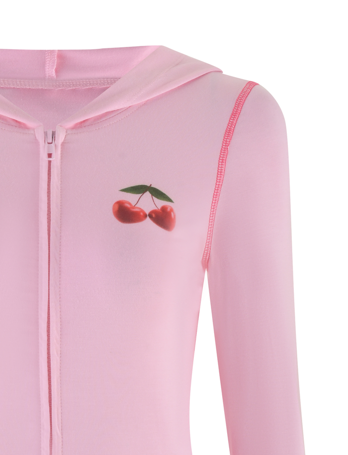 A close-up of the TIGERMIST BLAYZE HOODIE in soft pink, featuring a zip-up design, hood, and a small cherry graphic with two red cherries and green leaves on the left chest.