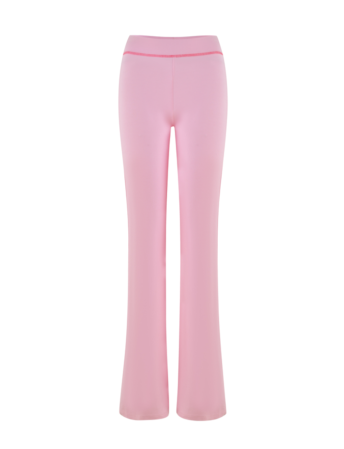 Front view of the TIGERMIST BLAYZE PANT in soft pink, high-waisted and flared, shown against a white background.