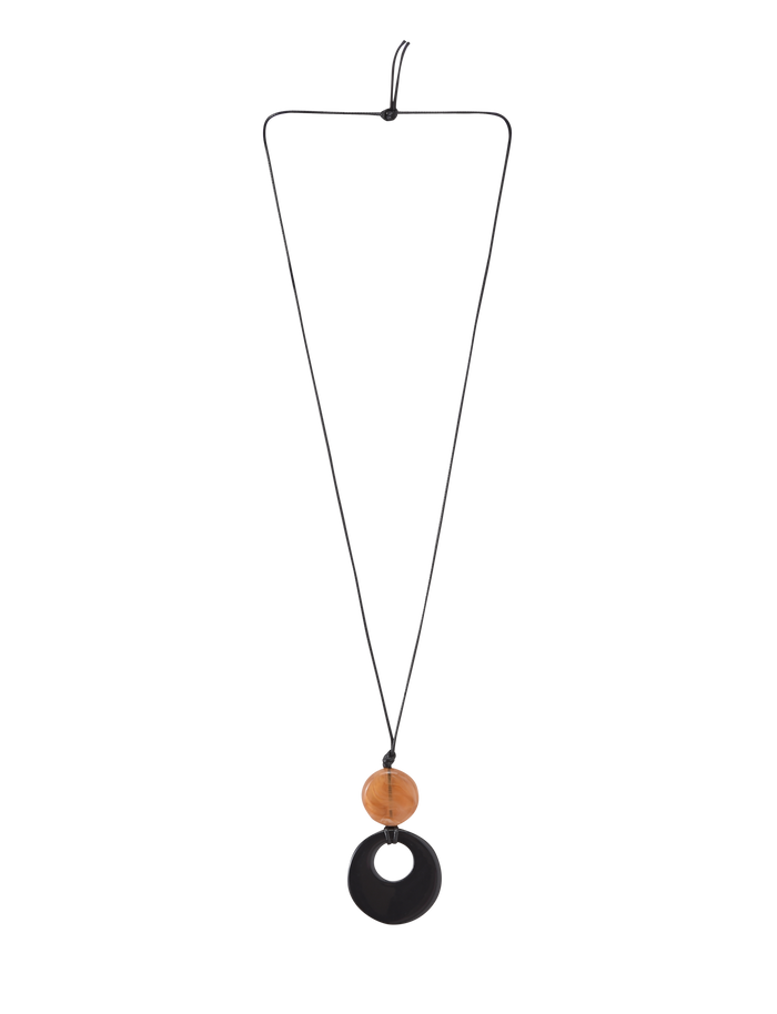 The BREYA PENDANT NECKLACE - TAN by TIGERMIST features a minimalist design with a black resin pendant and round wooden bead elegantly aligned on a long black cord.