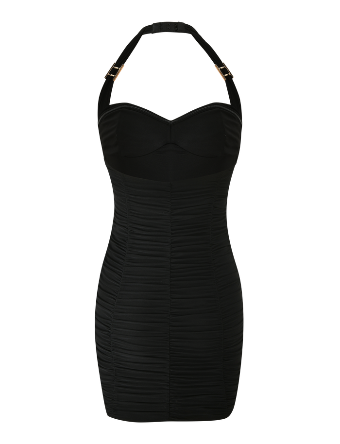 The BRIALLEN MINI DRESS by TIGERMIST is a black fitted mini dress with an adjustable halter neck, gold buckle strap details, and all-over ruched fabric, shown against a white background.