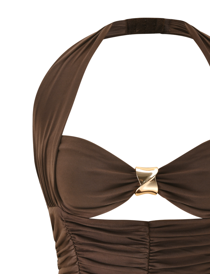 A close-up of the TIGERMIST BRIALLEN TOP in Chocolate, a halter-neck swimsuit with ruching and a gold accent at the center of the sweetheart neckline.