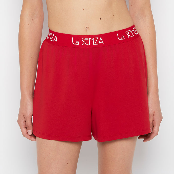 Brush Jersey Shorts with art deco logo in Crimson