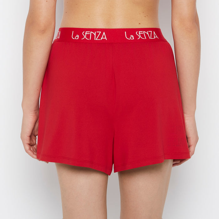 Brush Jersey Shorts with art deco logo in Crimson