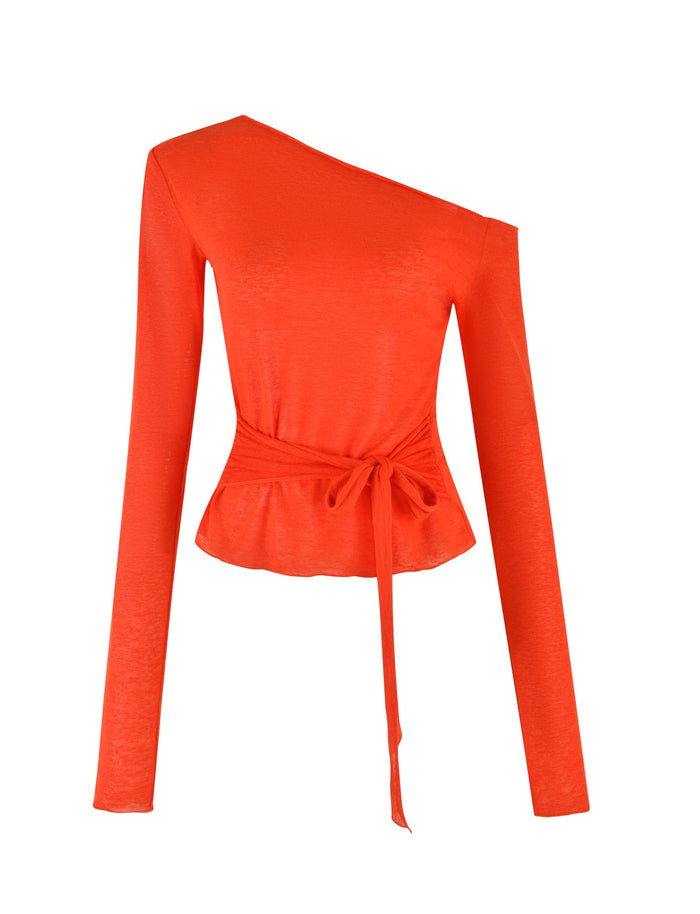 The BRYNA JUMPER - RED by TIGERMIST is a vibrant red, long-sleeved women's top showcasing an asymmetrical neckline with a one-shoulder design. Constructed from knit fabric, it features a fitted waist complemented by a self-tie belt and has a slight peplum flare at the bottom, allowing for adjustable styling.