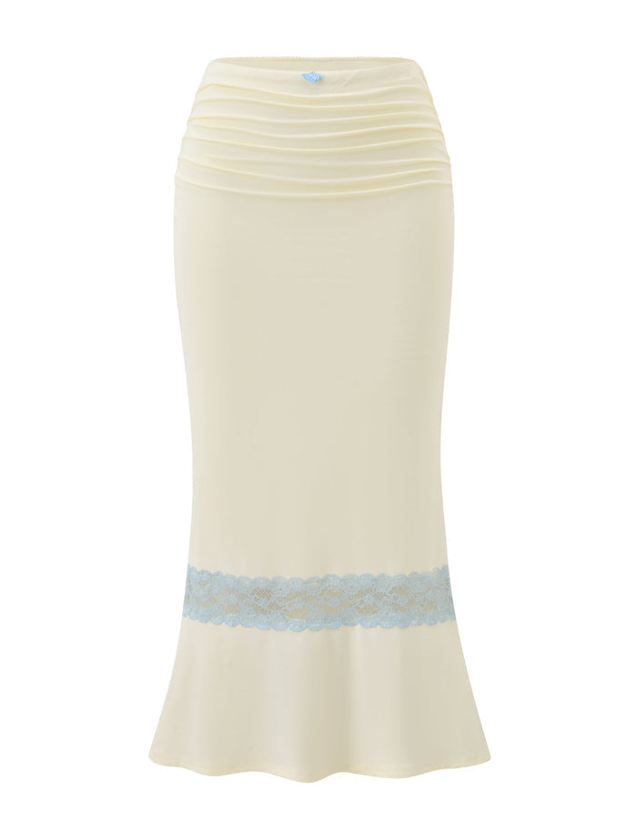 The CALINA LACE PANEL MIDI SKIRT by TIGERMIST features a high-waisted cream design with a ruched waist, horizontal blue lace band near the hem, and a slightly flared silhouette for an elegant finish.