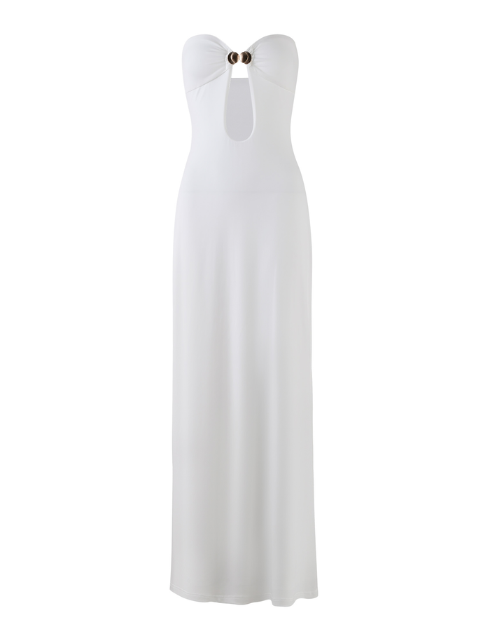 The TIGERMIST CECILY MAXI DRESS in white is strapless with a sweetheart neckline, a front cutout below the bust, and a gold metal shell clasp at the center of the chest.