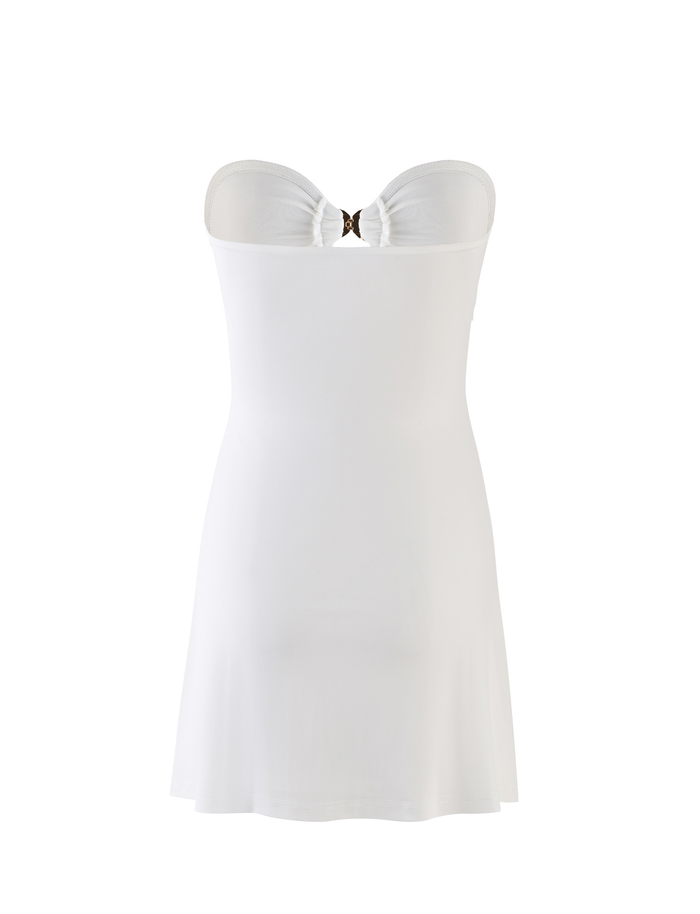 The TIGERMIST CECILY MINI DRESS - WHITE features a strapless, fitted bodice with a flared skirt, gathered center detail, and a small decorative cutout. The dress is mini length and set against a plain white background.