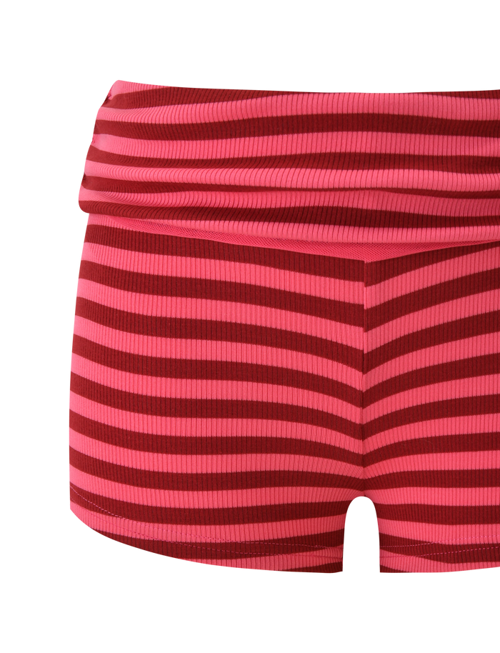 The TIGERMIST CERYS RIB SHORT features a high-waisted fit, foldover waistband, and ribbed knit texture with pink and red horizontal stripes.