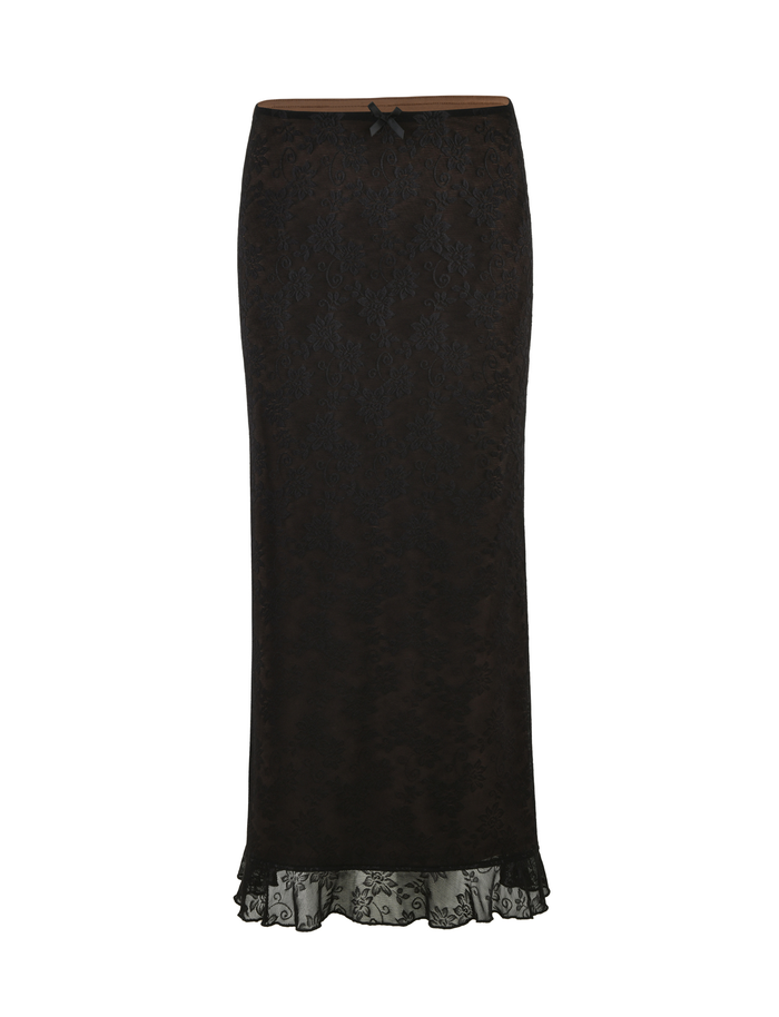 The CHARLEIGH SKIRT - BLACK : LACE by TIGERMIST is a black midi lace skirt with a subtle floral pattern, fitted silhouette, small waistband bow, and a ruffled hem, shown against a white background.
