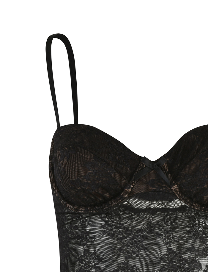 The TIGERMIST CHARLEIGH TOP - BLACK : LACE features delicate floral lace, spaghetti straps, a sheer bodice, and lightly padded cups for a feminine, sophisticated look.