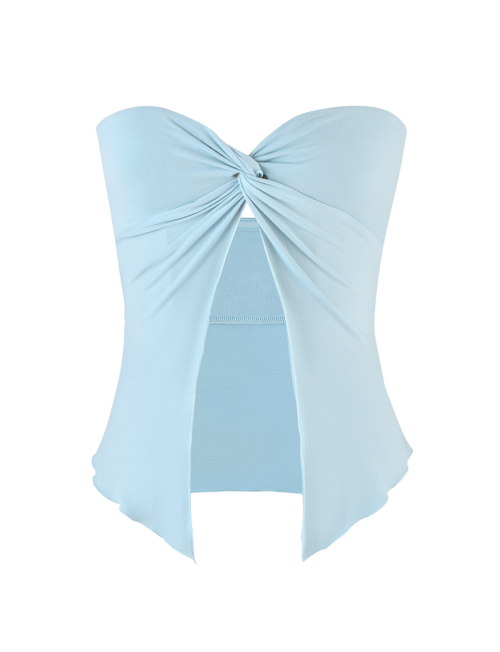 The TIGERMIST CHARMAINE TOP in baby blue is a strapless, high-stretch top featuring a twist detail at the bust, a front cut-out below the knot, and an asymmetrical hemline for soft, comfortable wear.