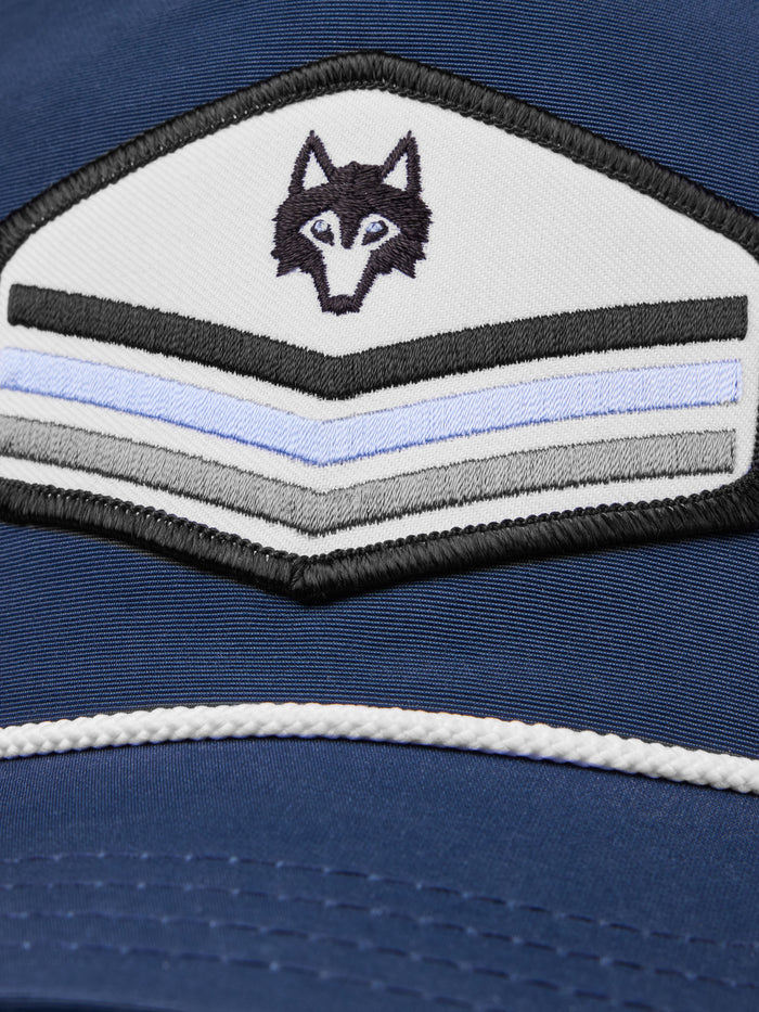 Maltese Golf Hat - Close-Up Wolf Head & Multicolor Chevron Embroidered Patch Detail | Greyson Clothiers