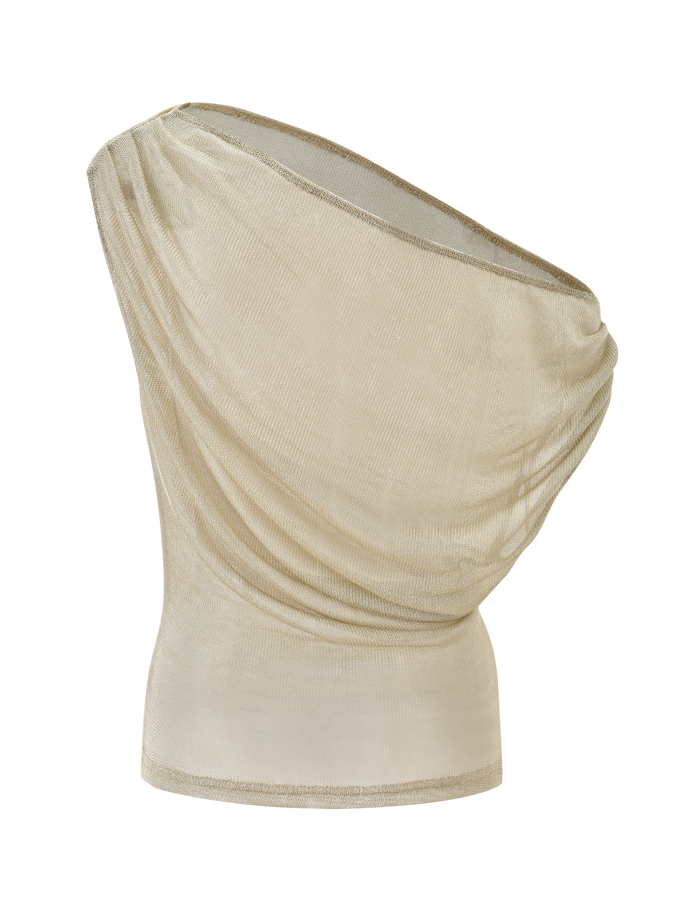 The CLANCY TOP - GOLD by TIGERMIST features a sheer, light beige off-shoulder design with draped fabric and an asymmetrical neckline, shown on a plain white background.