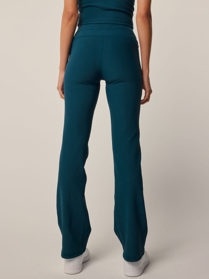 Aegean Cleo Flare Legging - Back View, High-Rise Waistband Detail | Greyson Clothiers