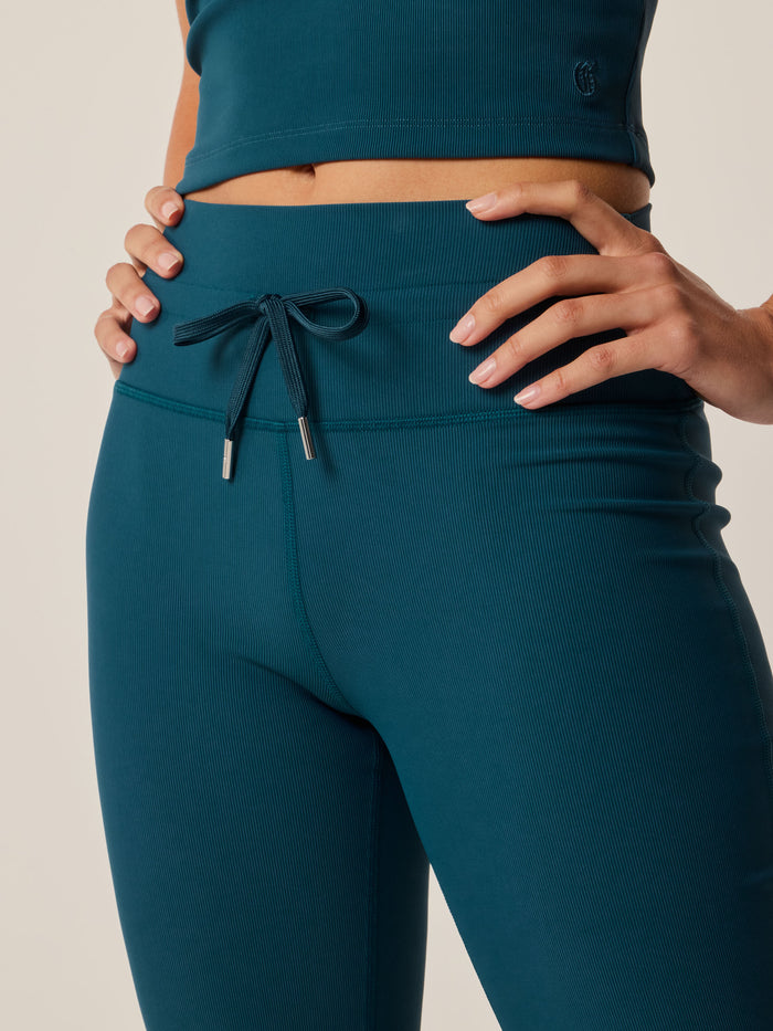 Aegean Cleo Flare Legging - Waistband Close-Up, Drawstring & Metal Tip Detail | Greyson Clothiers