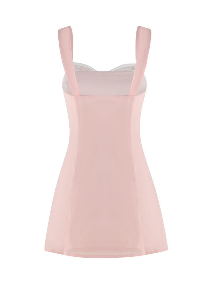 The COLSON MINI DRESS - PINK by TIGERMIST is a baby pink sleeveless dress with wide shoulder straps, a fitted yet slightly flared silhouette, smooth fabric, and a simple, elegant design viewed from the back.