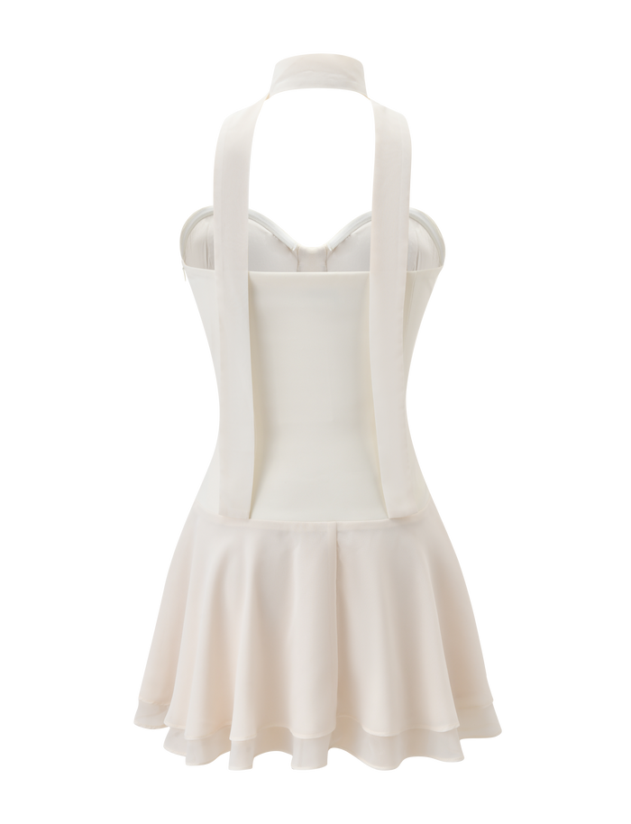 A back view of the TIGERMIST CORDELIE MINI DRESS in cream, featuring a sleeveless chiffon design, fitted corset bodice, long neck ties, flared ruffled skirt, zip closure, and a smooth elegant finish.