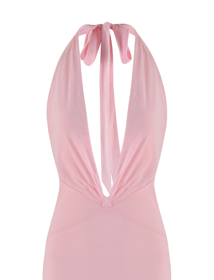 The CRESSIDA MAXI DRESS - PINK by TIGERMIST is a light pink halter neck dress featuring a deep V neckline, back neck tie, and made from soft, sheer high stretch fabric.