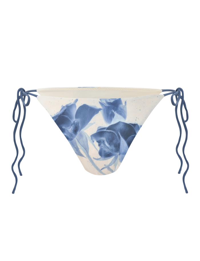 Pair the TIGERMIST CYLAS BIKINI BOTTOM - INDIGO FLORAL with a cloth face mask featuring blue rose print and adjustable blue ear loops for a coordinated summer style.
