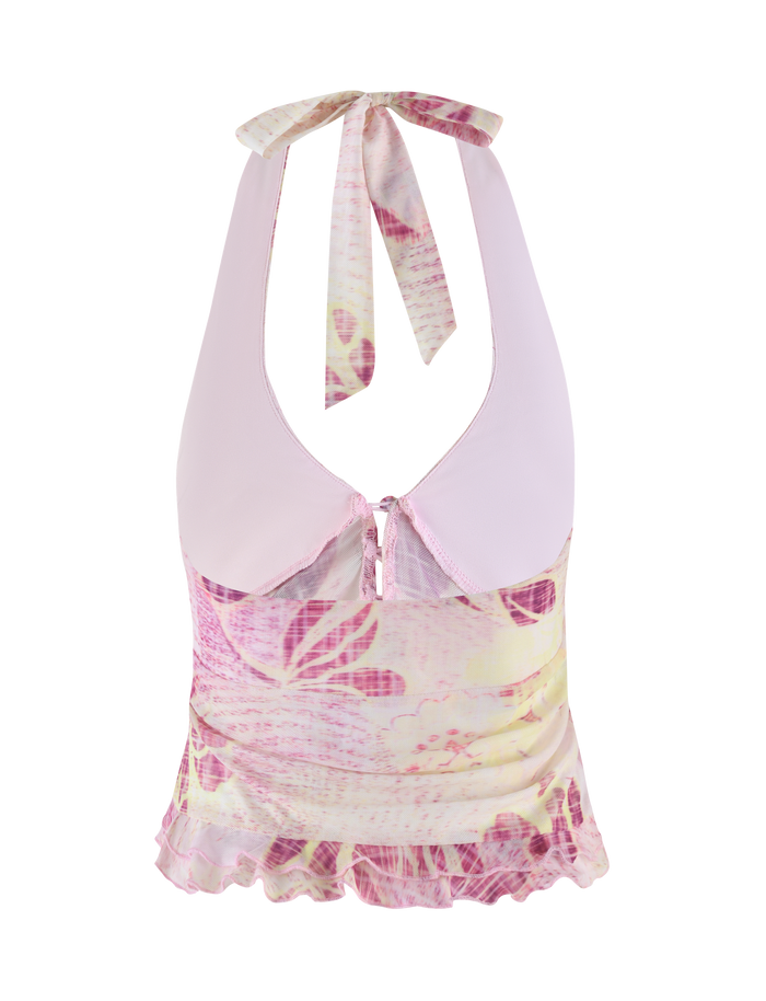 The TIGERMIST DALILA TOP in Grunge Floral Magenta is a sleeveless halter top with a deep neckline, wide collar, sheer pink and yellow floral print, neck tie, high-stretch fabric, and a ruffled hem.