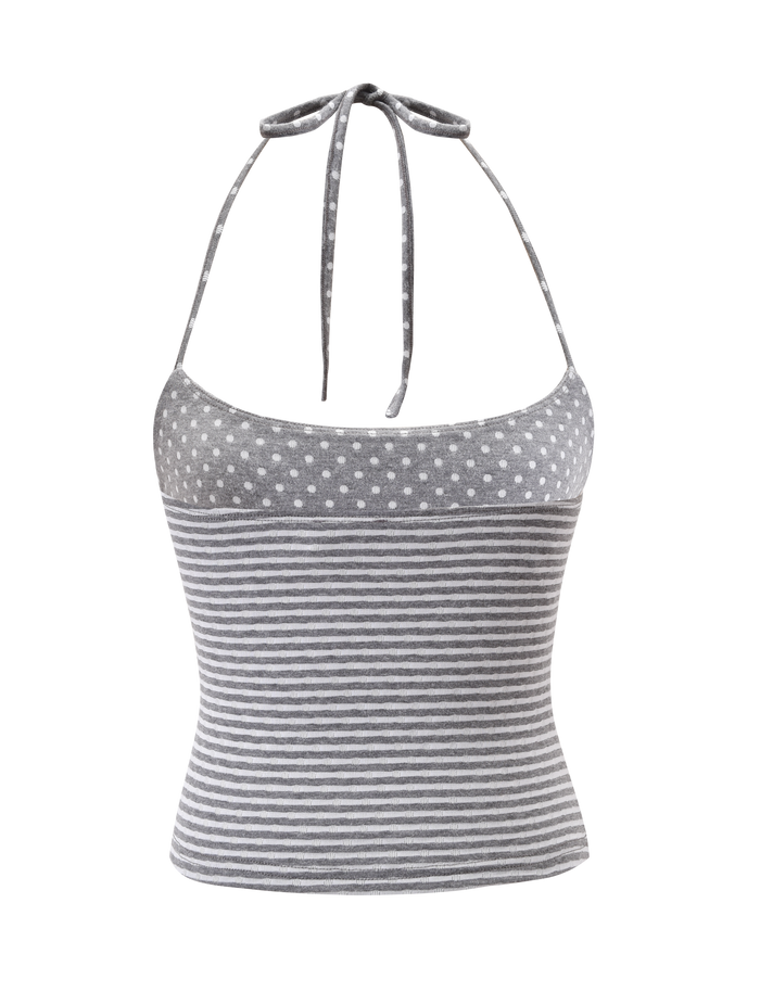 The DASHIELL TOP - HEATHER GREY by TIGERMIST is a gray rib knit halter top with white polka dots on the upper part, white horizontal stripes below, and adjustable neck ties, shown against a plain white background.