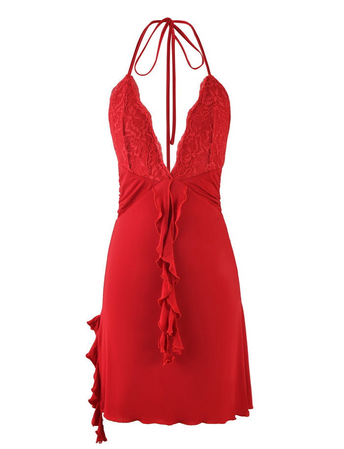 The DEENA DRESS - RED from TIGERMIST is a red halter-neck dress that showcases intricate lace detailing on the bodice and an open back. It features a deep V neckline, a fitted waist with a tie at the back, and a cascading ruffle down the front, ending just above the knee with a scalloped hem.