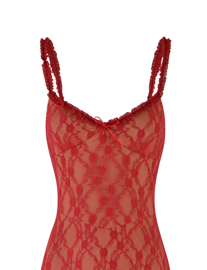 A close-up of the DEJA DRESS - RED : BERRY RED by TIGERMIST, a sheer lace midi with spaghetti straps, floral patterns, gathered strap details, a sweetheart neckline, and a small bow accent.