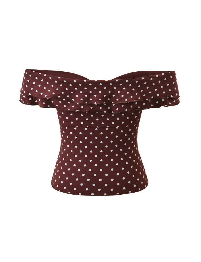 The DENALI TOP - BROWN DOT by TIGERMIST features a dark brown polka dot design with a ruffled off-the-shoulder neckline and sleeves, made from soft modal fabric and shown on a plain white background.