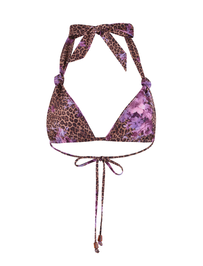The DESIRAE BIKINI TOP by TIGERMIST features a purple floral leopard print, adjustable triangle cups, a bow tie halter neck, and thin straps that tie at the back and front for a customizable fit.