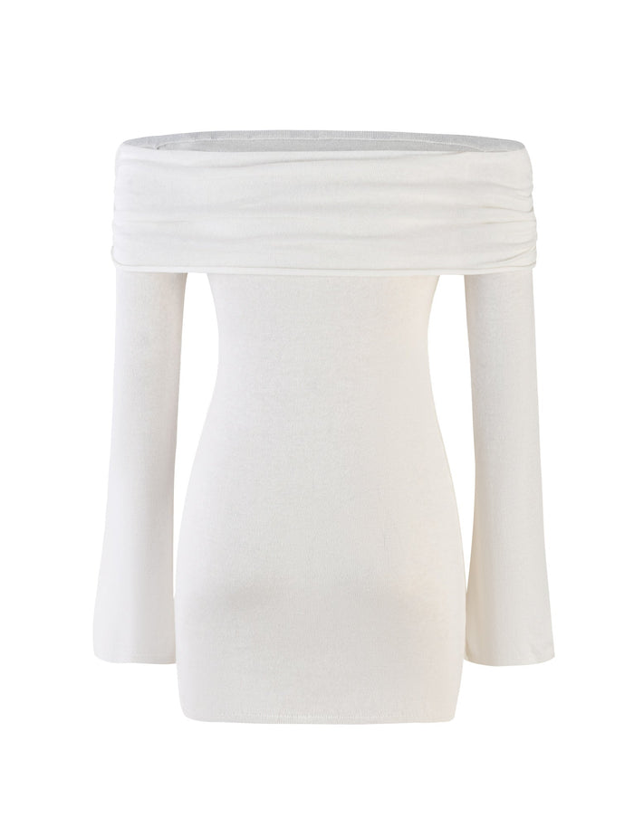 The DIEDRE JUMPER DRESS - WHITE : CREAM from TIGERMIST is a women's off-the-shoulder top with long sleeves and a form-fitting silhouette. The fabric appears soft and stretchy, creating a clean and elegant look suitable for various casual or semi-casual occasions.