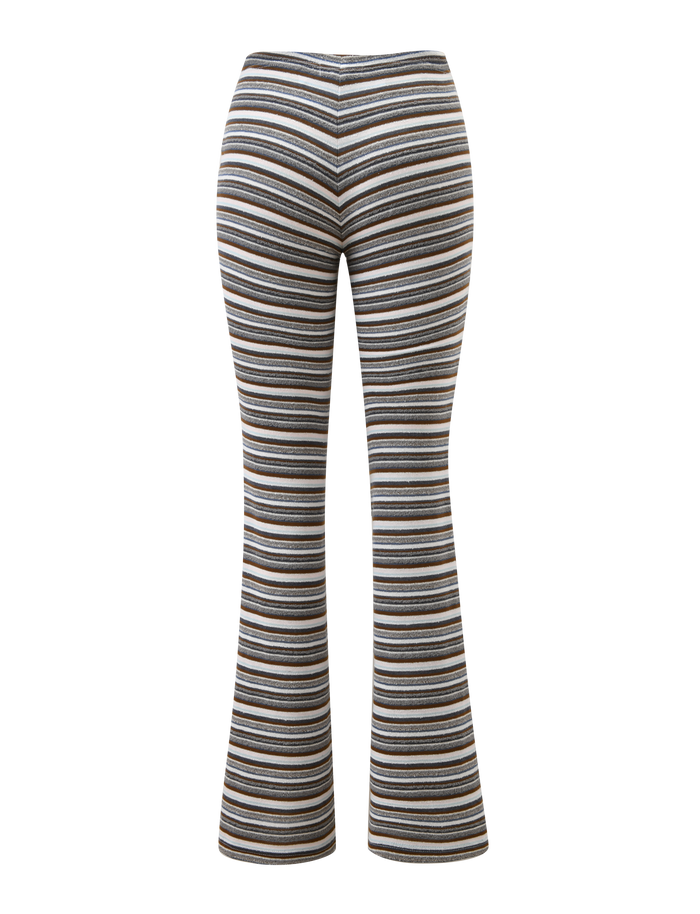 Back view of TIGERMIST DILLON PANT in blue and brown stripe, featuring a high-waisted, flared silhouette on a plain white background.