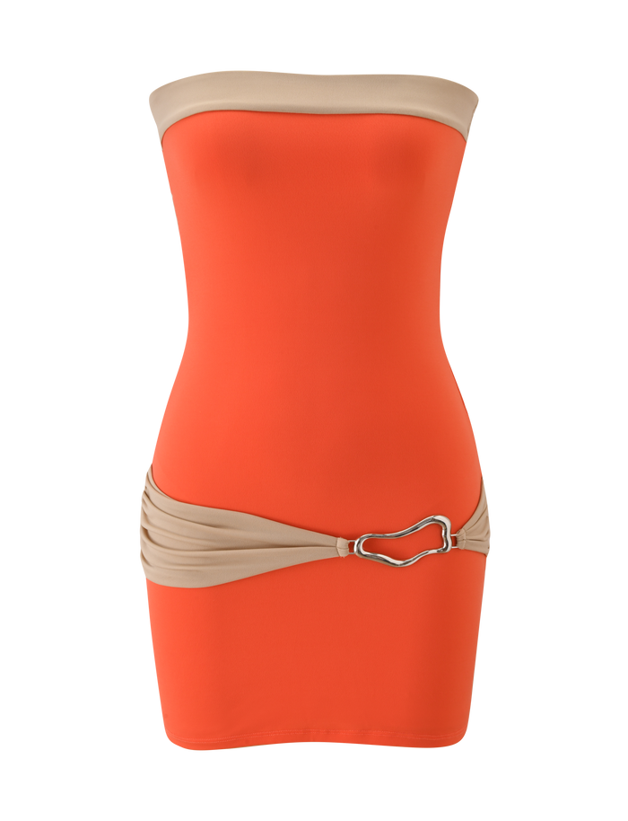 The TIGERMIST EOS MINI DRESS in persimmon and taupe is a strapless, color-blocked mini dress with beige bands and a silver heart-shaped buckle—perfect for parties.