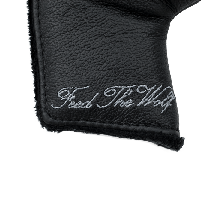 Feed the Wolf Putter Cover - Close-Up, Feed The Wolf Script Embroidery Detail on Black Leather | Greyson Clothiers